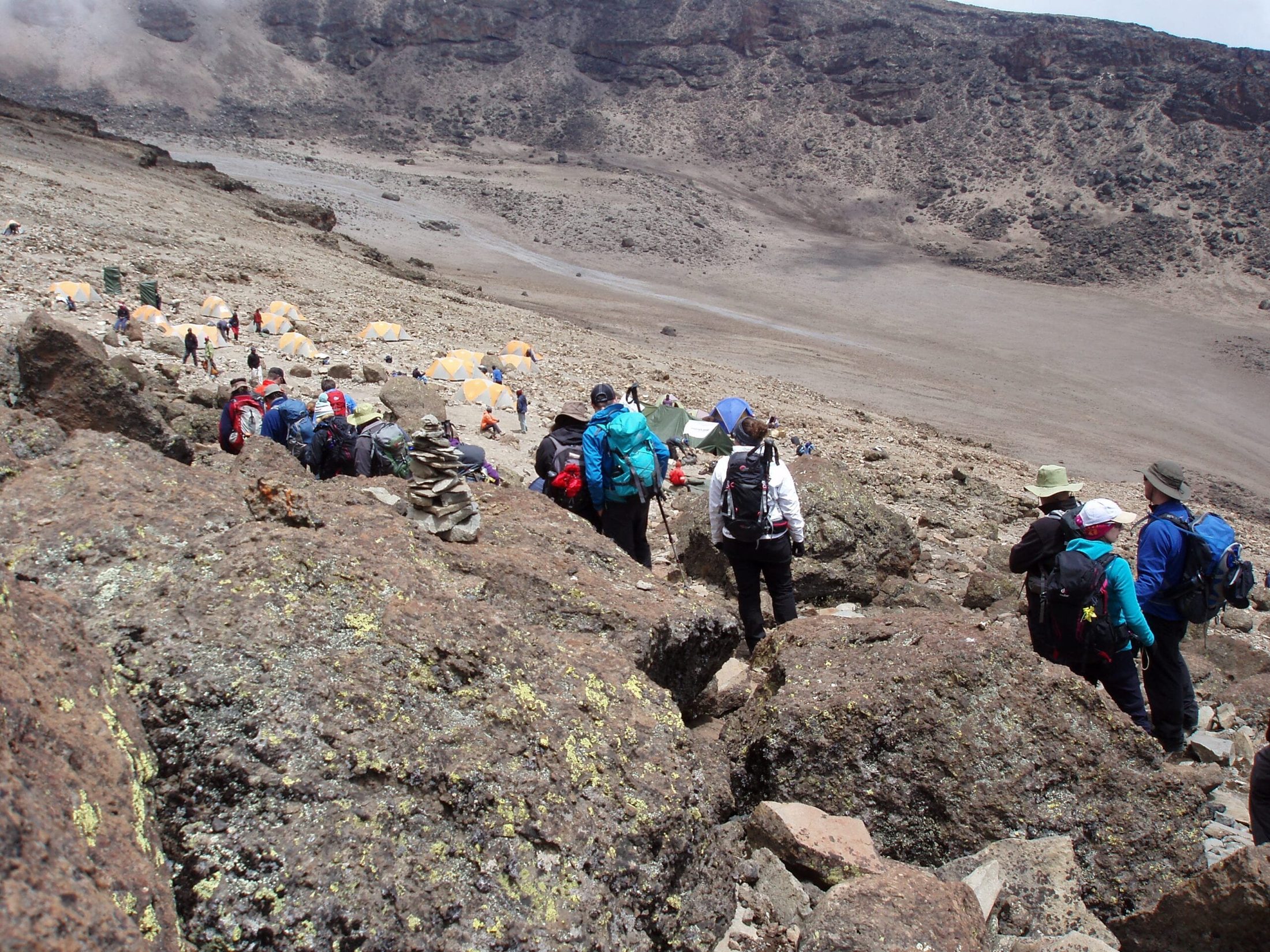 Mike Jones leading a group of climbers along the crater rim on Kilimanjaro